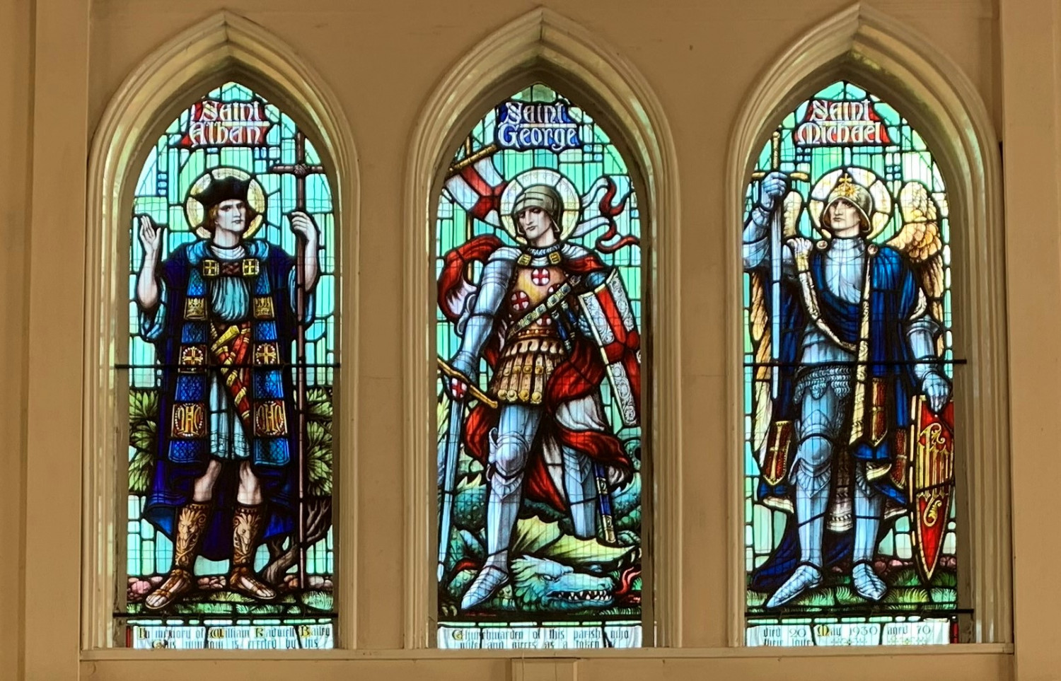 Stained glass windows behind the alter